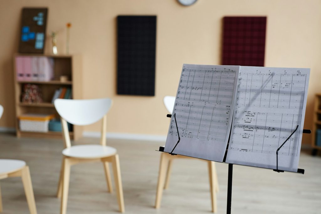 Notebook with sheet music in music class